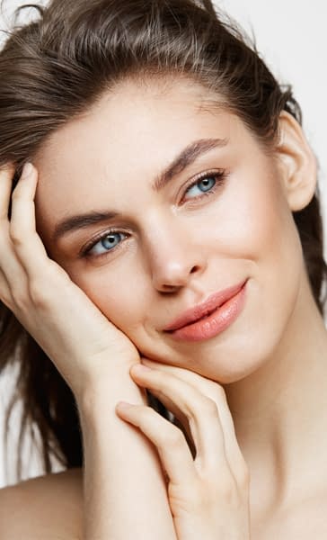 beautiful-young-woman-smiling-white-facial-treatment.jpg